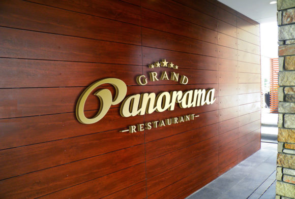 Elevating Brand Identity: The Strategic Impact of a 3D Golden Logo Mockup on Wooden Wall